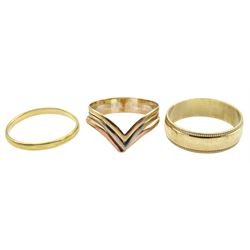18ct gold wedding band, Birmingham 1940, 9ct gold wedding band and a 9ct gold wishbone ring, all hallmarked or tested