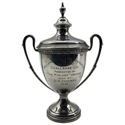Silver two handled challenge cup and cover of urn form 'Midland Bank Golf Association' London H18cm 1951 Maker Goldsmiths and Silversmiths Co.