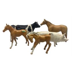 Beswick animals including Friesian cow 'Claybury Leegwater' 1362a in matt finish, White Boar 1453a, two Palomino foals 1085 and 1813 and a Palomino thoroughbred Stallion 1992 in matt finish (5)