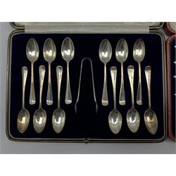 Set of twelve silver rat tail pattern coffee spoons and tongs London 1928 Maker Josiah Williams & Co, cased and a set of six silver handled dessert knives with classical urn decoration, cased.