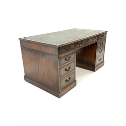 Georgian design mahogany pedestal desk with tooled leather writing surface, fitted with nine drawers on a plinth base 152cm x 84cm 