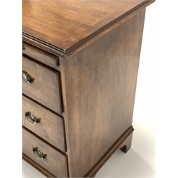 George III style walnut chest, with cross banded top over brushing slide and three long graduated drawers, raised on shaped bracket feet, W65cm, H77cm, D46cm