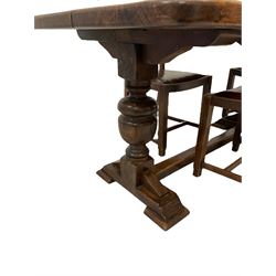 20th century oak dining table, rectangular top on turned pedestal supports, sledge feet joined by floor stretcher, and set four oak chairs