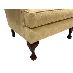 Georgian design two seat settee, humpback over rolled arms, upholstered in gold damask fabric with foliate patterns, raised on cabriole supports terminating in ball and claw feet
Provenance: From the Estate of the late Dowager Lady St Oswald