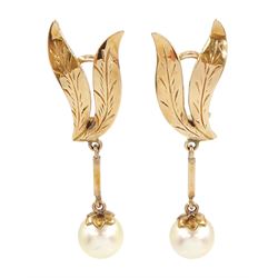 Pair of gold cultured pearl pendant clip on earrings, with leaf surmounts