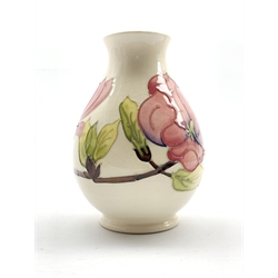  Moorcroft baluster vase decorated in the Pink Magnolia pattern on a cream ground H19cm  