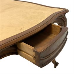 20th century French walnut card table, the shaped and moulded top with peach coloured velvet inset, each side fitted with frieze drawer, shaped and moulded rails on cabriole supports with scroll carved terminals