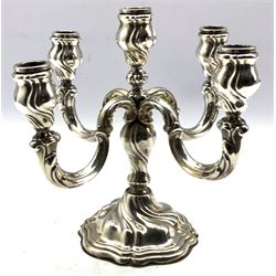 Silver five light candelabrum of scroll design on a dished circular foot H23cm marked 'Sterling 925' approx 20oz