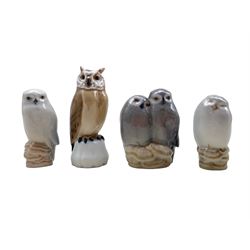 Three Royal Copenhagen porcelain Owls comprising a pair of Owls no. 834 designed by Theodor Madsen, Owl Asleep no. 1742 and another no. 1741 both designed by Theodor Madsen and a Bing & Grondahl Owl no. 1800 designed by Jens Peter Dahl Jensen H11cm (4)