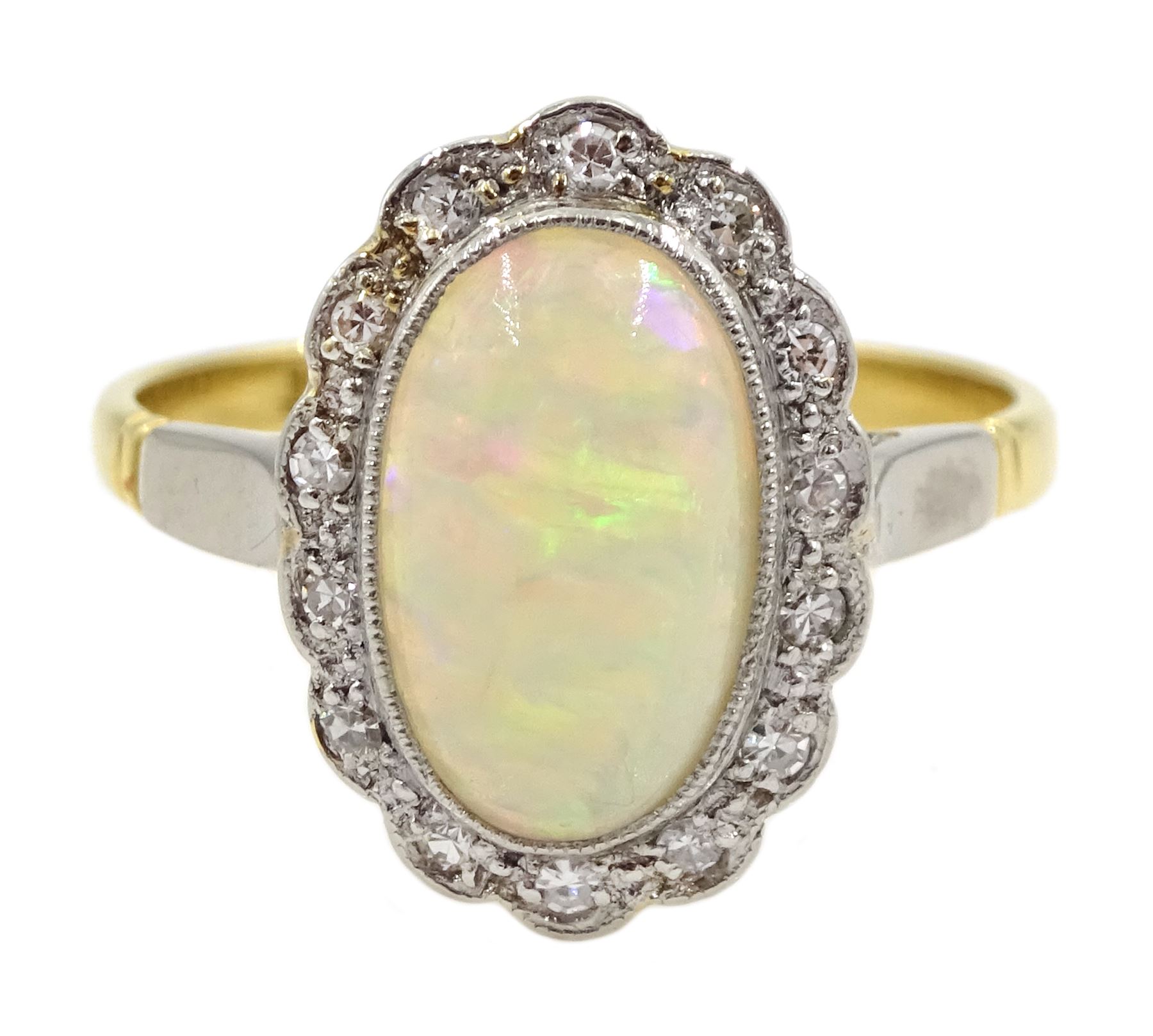 DS Gold oval opal and diamond, milgrain set cluster ring, makers mark B ...