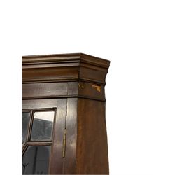 19th century mahogany floor standing corner cabinet, projecting moulded cornice over four astragal glazed doors, on bracket feet