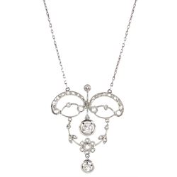 Edwardian platinum milgrain set diamond pendant necklace, old and rose cut diamonds set within an openwork setting, suspending from a trace link chain