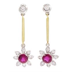 Pair of 18ct gold ruby and diamond floral cluster pendant earrings, round cut rubies within diamond set petals suspended from knife-edge bars to diamond surmounts, hallmarked, total diamond weight approx 0.15 carat