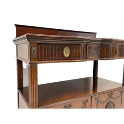 Maple & Co. - late Victorian walnut buffet sideboard, raised back over moulded top with shaped front, fitted with two drawers with arcade carved fronts, cupboard below enclosed by two doors, decorated with bellflower and ribbon garlands and flower head roundels, square fluted uprights, lower mould over turned feet, metal label to door interior 