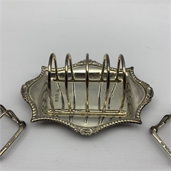 Edwardian silver four division toast rack with integral stand London 1901 Maker William Hutton and a pair of small silver four division toast racks Sheffield 1911 Maker Atkin Bros. 8.2oz