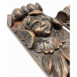 Pair of 18th Century carved oak corbels with cherub heads, fruit and leaves  54cm x 9cm
