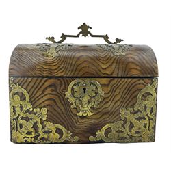 Victorian ash dome top tea caddy, with engraved brass mounts and handle, the hinged lid opening to reveal two compartments, lacking covers, L22.5cm x H16cm