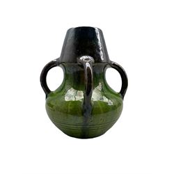 Art Nouveau green glazed vase with four tendril handles, H26cm