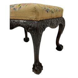 Georgian design cabriole leg stool, rectangular form upholstered in floral needlework cover, the shaped rails carved with shell and trailing foliate, acanthus carved cabriole supports with ball and claw feet