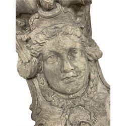 Composite corbel, the central mask in the form of the Gorgon Medusa with extending garland braids, the crown surmounted by a scroll bracket with acanthus leaf pediment, the cartouche apron set with a central rosette