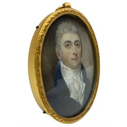19th century oval portrait miniature, watercolour on ivory of a gentleman wearing a blue coat and white stock 7cm x 5cm. This item has been registered for sale under Section 10 of the APHA Ivory Act