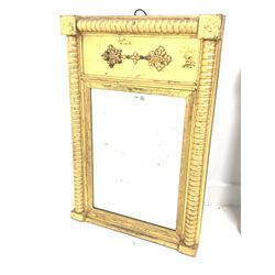 19th century upright gilt framed wall mirror with half round bobbin turned pilasters and applied floral decoration to frame 45cm x 58cm