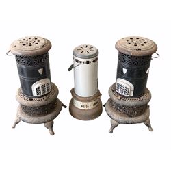Three paraffin heaters 