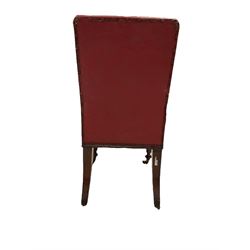 Set ten mid-19th century mahogany boardroom chairs, upholstered in buttoned oxblood faux leather, turned and faceted supports with raised panels, on brass castors 
