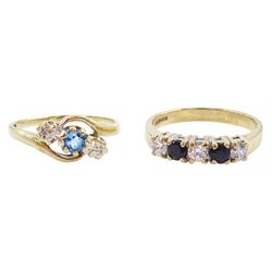 Gold three stone blue topaz and diamond ring and a gold four stone sapphire and cubic zirconia ring, both hallmarked 9ct