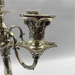 Edwardian silver five light candelabrum of Adam design with scroll branches, the square base cast with urns and foliage H46cm Sheffield 1909 Maker Hawksworth Eyre & Co