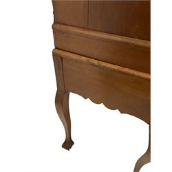 19th century walnut chest on stand, projecting moulded cornice over four long graduating drawers, the stand with shaped apron on angular cabriole supports with ball and claw carved feet
