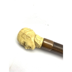 Victorian rosewood walking cane with later ivorine finial in the form of a gentleman's head wearing a monocle and cap, L86cm 