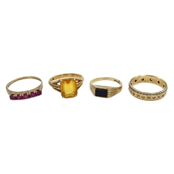 Gold citrine ring, gold onyx ring and a cubic zirconia eternity ring, all 9ct hallmarked or stamped and an 8ct gold stone set ring stamped 333