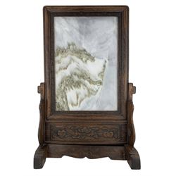 Chinese Dali marble 'Dreamstone' table screen, the panel with alternating light and dark grey swirls, reminiscent of a dreamy landscape, within a carved hardwood stand, H52cm x W32cm