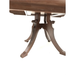 Georgian style mahogany circular dining table, raised on four reeded splayed supports 