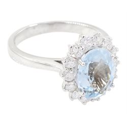 18ct white gold oval cut aquamarine and round brilliant cut diamond cluster ring, hallmarked, aquamarine approx 2.50 carat, total diamond weight approx 0.90 carat