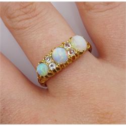Edwardian three stone opal and four  clear stone ring, London 1910