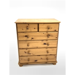 Modern polished pine chest fitted with two short and four long drawers, raised on compressed bun supports, W84cm, H94cm, D46cm