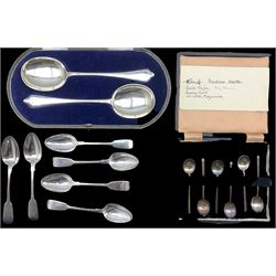 Pair of silver serving spoons, the rat tail bowls with engraved inscriptions in fitted case Sheffield 1921 Maker C W Fletcher & Son, set of six Victorian silver fiddle pattern tea spoons London 1853 and a cased set of six silver coffee spoons Sheffield 1943 8.5oz