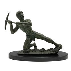 French Art Deco sculpture of miner with pick axe upon naturalistic base mounted on onyx plinth W54cm