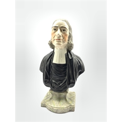 Early 20th century bust of the Reverend John Wesley, modelled half length, wearing clerical robes, upon on a shaped marbled plinth, with a plaque to the reverse impressed with biographical information relating to Wesley, H30cm