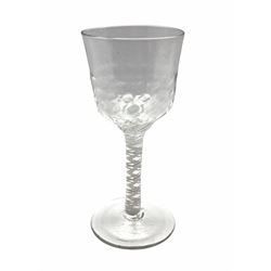 18th century wine glass with ogee bowl, the lower part with a 'dimpled' decoration on a double series cotton twist stem and circular foot H19.5cm 
