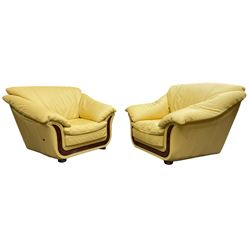 Atelier Nieri - pair of Italian contemporary 'Corniche' armchairs, upholstered in yellow leather with a polished burr wood trim, raised on compressed bun feet