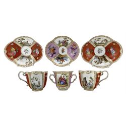 Pair of Meissen cabinet cups and saucers of lobed oval design decorated with coastal scenes, flower heads etc on an ochre ground and a Dresden two handled cabinet cup and saucer with panels of figures and flowers (3)
