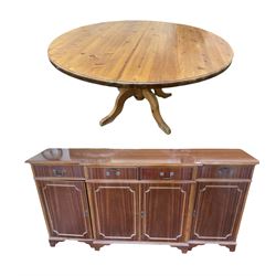 Mahogany sideboard, four drawers over four cupboards and a Large circular victorian style pine dining table (2)