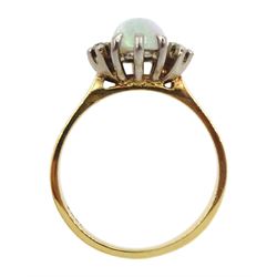 Gold opal and four stone round brilliant cut diamond ring, stamped 18ct