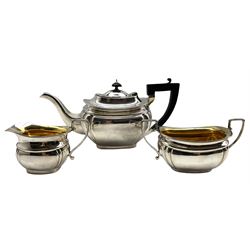 Silver three piece teaset of rectangular form, the milk jug and sugar bowl with gilded interiors Sheffield 1957 Maker Viners 37.5oz