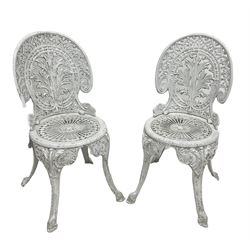 Pair of Victorian style white painted cast aluminium garden chairs 