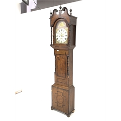 Early to mid 19th century longcase clock, the oak case with three brass ball finials over swan neck pediment, arched hood door and turned pilasters, inlaid with rosewood and mahogany banding, white and purple enamel dial with gilt detail inscribed 'S. Cooke, Pershore' with Roman chapter ring, subsidiary date and seconds ring, eight day movement striking the hours hammer on bell
