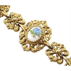9ct gold bracelet, each open work link with a porcelain plaque painted with a flower, hallmarked